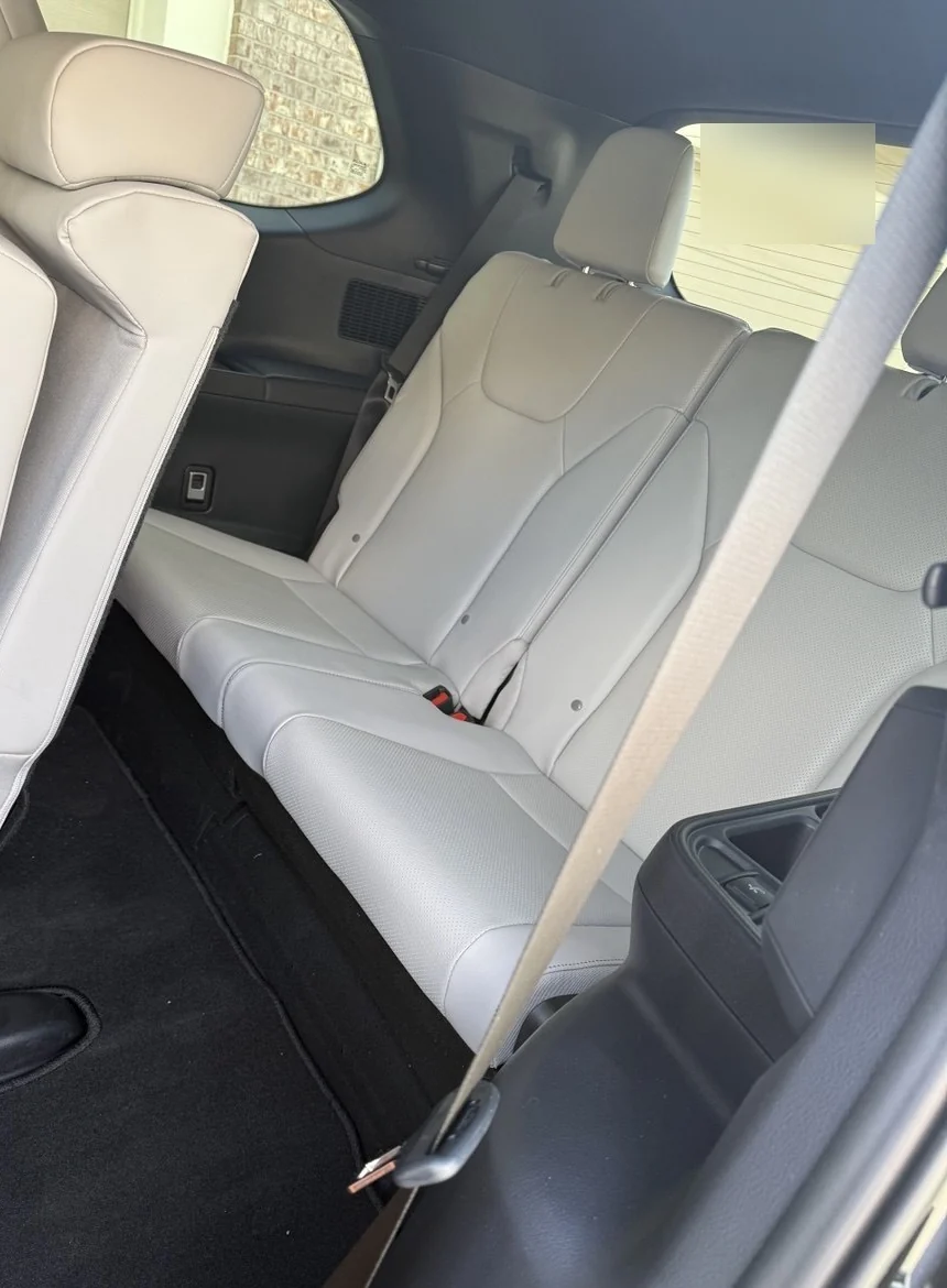 Rear passenger seating area inside the Lexus TX 350 AWD
