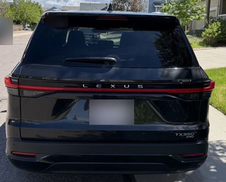 Rear view showing the Lexus TX 350 AWD model badge